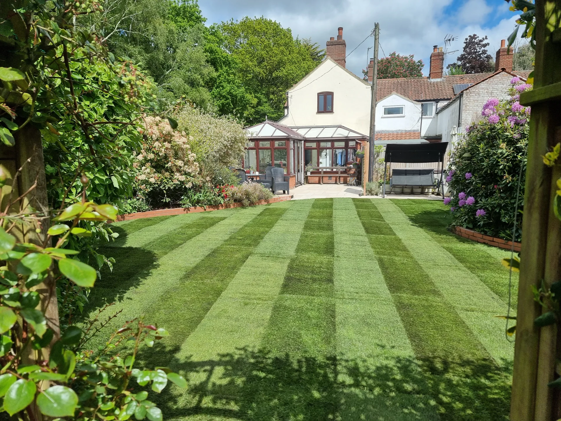 Garden improvement project in Norfolk with new lawn